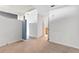Bright bedroom with carpet, neutral walls, and open door to the bathroom at 3300 Windy Ridge Se Pkwy # 1107, Atlanta, GA 30339