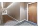 Hallway featuring neutral tones, modern lighting, and carpeted flooring at 3300 Windy Ridge Se Pkwy # 1107, Atlanta, GA 30339