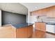 Open living room featuring an island with granite countertop at 3300 Windy Ridge Se Pkwy # 1107, Atlanta, GA 30339