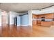 Spacious living room with hardwood floors and an open concept kitchen at 3300 Windy Ridge Se Pkwy # 1107, Atlanta, GA 30339