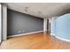 Expansive living area boasting hardwood floors, concrete ceilings, and modern design at 3300 Windy Ridge Se Pkwy # 1107, Atlanta, GA 30339