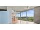 Bright living room with floor-to-ceiling windows and a view of greenery at 3300 Windy Ridge Se Pkwy # 1107, Atlanta, GA 30339