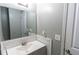 Bathroom with a single sink vanity and neutral paint at 3963 Ferncliff Rd, Snellville, GA 30039