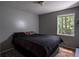 Bedroom featuring a large window for natural light at 3963 Ferncliff Rd, Snellville, GA 30039