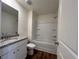 Bathroom featuring a shower and granite countertop at 1958 Asher Ln # 50, Conyers, GA 30013