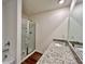 Bathroom featuring a tiled shower, tub and a granite countertop with dual sinks at 1958 Asher Ln # 50, Conyers, GA 30013