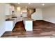 Large open kitchen with a center island and granite counters at 1958 Asher Ln # 50, Conyers, GA 30013