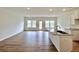 Open kitchen area with stainless steel sink and hardwood floors at 1958 Asher Ln # 50, Conyers, GA 30013