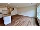 Hardwood floor kitchen featuring granite countertops and an island at 1958 Asher Ln # 50, Conyers, GA 30013