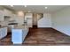 Spacious kitchen featuring an island, granite countertops, and hardwood floors at 1958 Asher Ln # 50, Conyers, GA 30013