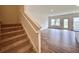 Bright living room featuring hardwood floors and a sliding glass door at 1958 Asher Ln # 50, Conyers, GA 30013