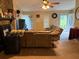 Open-concept living room, showcasing the entryway and abundant natural light at 2523 Bronco Trl, Duluth, GA 30096