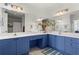 Stylish bathroom with double sink vanity and large mirrors at 3334 Peachtree Ne Rd # 1609, Atlanta, GA 30326