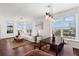 Bright living space with hardwood floors, white walls, and plenty of natural light at 3334 Peachtree Ne Rd # 1609, Atlanta, GA 30326