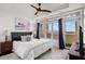 Bright main bedroom with large windows, a ceiling fan, and a view at 3334 Peachtree Ne Rd # 1609, Atlanta, GA 30326