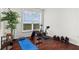 Home gym with exercise bike, weights, and yoga mat at 3334 Peachtree Ne Rd # 1609, Atlanta, GA 30326