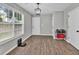 Mud room entryway featuring tile floors, ample storage, and lots of natural light at 620 Alcovy Springs Dr, Lawrenceville, GA 30045
