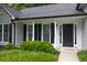 Charming front entrance with a well-manicured lawn and inviting doorway at 620 Alcovy Springs Dr, Lawrenceville, GA 30045