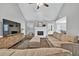 Inviting living room with vaulted ceilings, fireplace, and comfortable seating arrangement at 620 Alcovy Springs Dr, Lawrenceville, GA 30045
