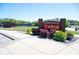 Community sign for The Mill Amphitheater, surrounded by manicured landscaping at 1023 Merritt Dr # 100, Villa Rica, GA 30180