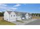 Attractive townhome exterior showcasing attached garages and colorful facades at 1023 Merritt Dr # 100, Villa Rica, GA 30180
