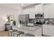 Bright kitchen with stainless steel appliances, a center island, and granite countertops at 1023 Merritt Dr # 100, Villa Rica, GA 30180