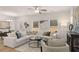 A bright living room features a comfortable sofa, neutral decor, and stylish accessories at 1023 Merritt Dr # 100, Villa Rica, GA 30180