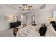A bright, well-lit main bedroom features an upholstered bed frame and lots of natural light at 1023 Merritt Dr # 100, Villa Rica, GA 30180