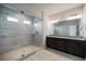 Modern bathroom featuring a glass-enclosed shower and double vanity with granite countertop at 2924 Weyhill Trl, Buford, GA 30519