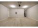 Spacious garage with ample room for parking and storage, featuring concrete flooring at 2924 Weyhill Trl, Buford, GA 30519