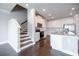 Well-lit kitchen with an island, stainless steel appliances, granite countertops, and white cabinets at 2924 Weyhill Trl, Buford, GA 30519