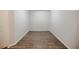 Empty room featuring modern, light-colored walls and wood-look flooring at 2924 Weyhill Trl, Buford, GA 30519