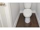 Neat and well-kept toilet room showing a ceramic toilet and flooring at 2924 Weyhill Trl, Buford, GA 30519