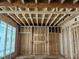 The interior framing of new construction with visible wood beams at 3425 Dr Bramblett Rd, Cumming, GA 30028