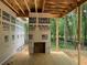 Framing of the porch in the new construction home with natural surroundings at 3425 Dr Bramblett Rd, Cumming, GA 30028