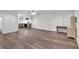 Finished basement with kitchen, bathroom, vinyl floors, and a desk providing versatile space at 399 Towler Drs, Loganville, GA 30052
