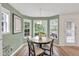 Bright breakfast nook with a view of the outdoor deck and backyard at 399 Towler Drs, Loganville, GA 30052