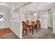 Inviting dining room featuring elegant lighting and decor, perfect for Gathering meals at 399 Towler Drs, Loganville, GA 30052
