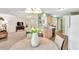 Open-concept kitchen and living area features modern appliances and a smooth transition for entertaining at 399 Towler Drs, Loganville, GA 30052