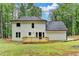 Backyard view of the deck and home at 545 Woodrow Dr, Lawrenceville, GA 30043