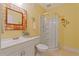 Bathroom with a walk-in shower, white vanity and tile flooring at 155 Edgewater Trl, Canton, GA 30115