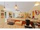 Kitchen and connected living spaces with granite countertops and lots of natural light at 155 Edgewater Trl, Canton, GA 30115