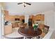 Well-appointed kitchen with light wood cabinets, granite countertops, and stainless appliances at 155 Edgewater Trl, Canton, GA 30115