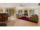 Comfortable living room with a fireplace, neutral-toned furniture, and bar seating for relaxed gatherings at 155 Edgewater Trl, Canton, GA 30115