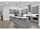Contemporary kitchen featuring gray cabinets, stainless steel appliances, and a spacious island at 2139 Kirkham Way, Kennesaw, GA 30152