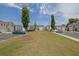 Scenic street view showcasing meticulously landscaped greenery and curb appeal of the surrounding neighborhood at 2139 Kirkham Way, Kennesaw, GA 30152