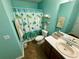 Cozy bathroom featuring a shower with themed curtain and a vanity at 23 Jennifer Ln, Rydal, GA 30171