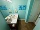Bathroom featuring a single sink vanity and modern lighting fixtures at 23 Jennifer Ln, Rydal, GA 30171