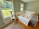 Relaxing bathroom with a soaking tub and bright window view at 23 Jennifer Ln, Rydal, GA 30171