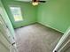 Bright bedroom with a large window and neutral carpet at 23 Jennifer Ln, Rydal, GA 30171